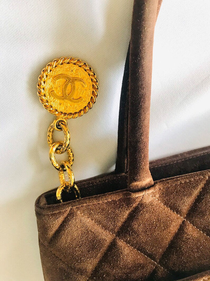 CHANEL Vintage brown suede classic tote bag with large CC mark and golden CC medal charm to the zipper