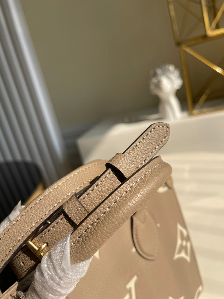 Louis Vuitton  OnTheGo PM Bag