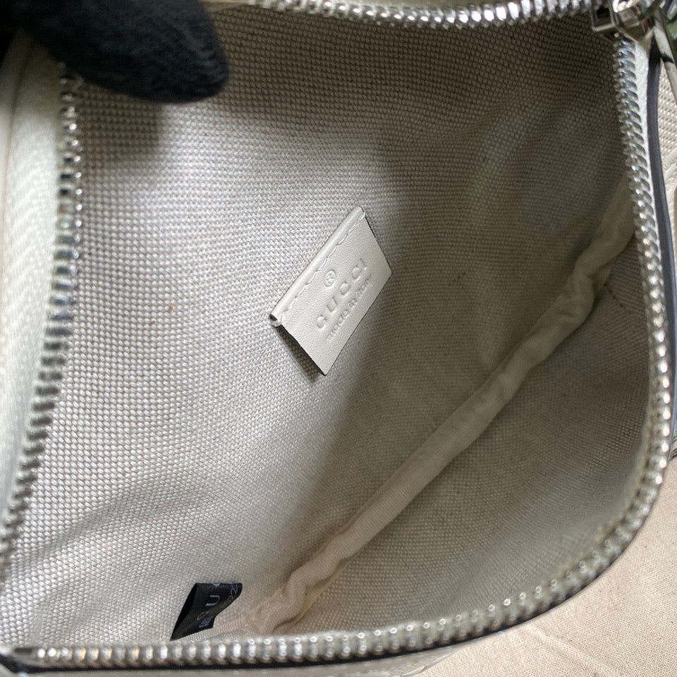 Gucci GG Embossed Belt Bag