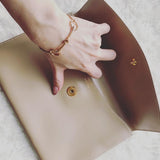 HERMES leather clutch